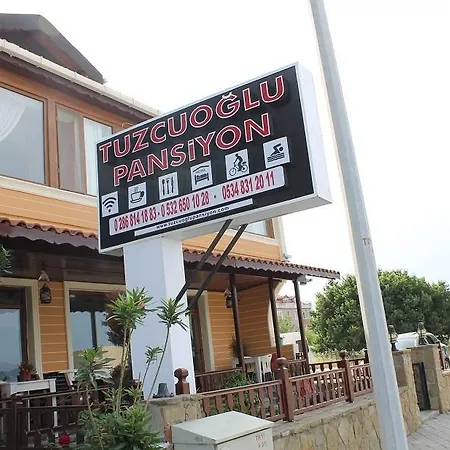 Tuzcuoglu *